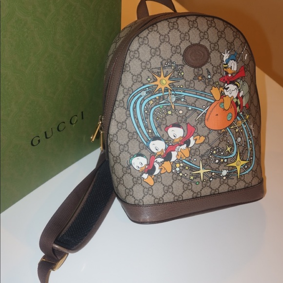 GUCCI X DISNEY GG SUPREME DONALD DUCK BACKPACK - Picture 9 of 13